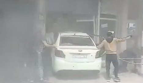 اقتحام محل تجاري بسيارة اجرة